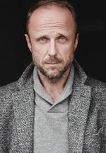 Aktor Łukasz Simlat