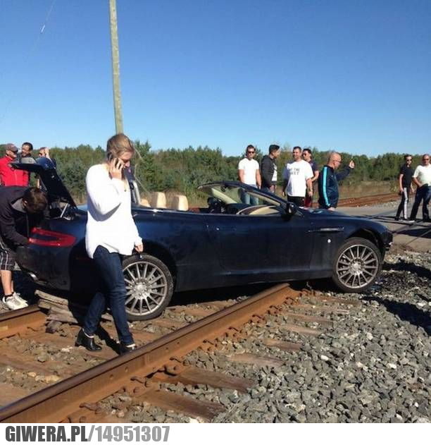 Tato przyjedź,kobieta za kierownica,tory