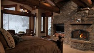 2 hours of Snow falling view with fireplace crackling sound