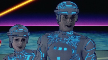 A computer hacker is abducted into a digital world and forced to participate in gladiatorial games where his only chance of escape is with the help of a heroic security program.