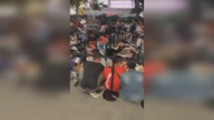 LiveLeak - Hundreds in Singapore sleep outside Apple Store to get hands on iPhone 11