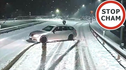 Wyprzedzanie i poślizg BMW na zaśnieżonej drodze
