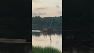 Statek na Wiśle a w tle zachód słońca i Sandomierz