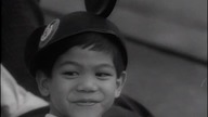 Polska Kronika Filmowa nr 21 z 1990 r.  – Disneyland, Mini biznes, Reksio w Maluchu, Mamy swoje, Przed sesją, Symbole idei, Według Hanuszkiewicz