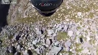 Jeb Corliss breaks both legs during a base jumping mishap