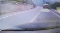 LiveLeak - Man climbs onto truck to stop it from crash
