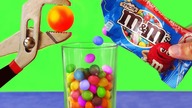GLOWING 1000 DEGREE METAL BALL VS M&Ms 8 Crazy Experiments