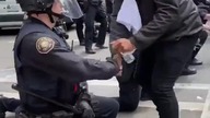 Portland police on knees, support for protesters