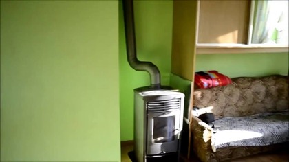 Po kapitalnym remont mieszkania u Dzika %2C aneks kuchenny w kamieniu ozdobnym na srodku pokoju