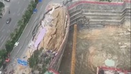 LiveLeak - Destroyed road collapses onto a construction site in southern China