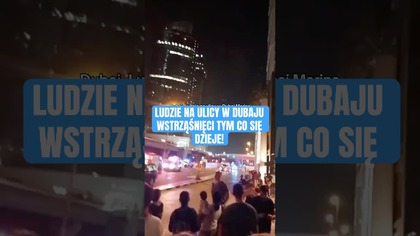 LUDZIE NA ULICY W DUBAI MARINA WSTRZĄŚNIĘCI TYM, CO DZIEJE SIĘ W MIEŚCIE.