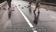 Ukrainian soldiers demining the road - funny