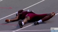 Infinite Tucker - goes full Superman to win 400m hurdles