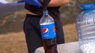 Experiment: the Balloons of Coca Cola & Pepsi VS a Bottle of Mentos.  Cool reaction!