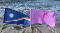 Martine Islands and Susanna Island flag waving on the beach