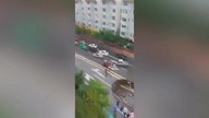 LiveLeak - Huge sinkhole swallows taxi after opening up on Chinese road