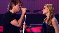 Bon Jovi till we aint strangers anymore