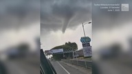 Funnel Cloud Forms Between Two Cities in El Salvador