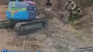 Ukraińcy zakopują swoich poległych w bezimiennych grobach