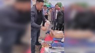 LiveLeak - Cleaver salesman demonstrating the sharpness of the knife
