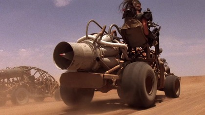 After being exiled from the most advanced town in post-apocalyptic Australia, a drifter travels with a group of abandoned children to rebel against the towns queen.