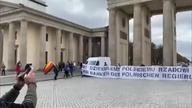 Nov, 2021.  Brand.  Gate, Berlin: Germans thank the polish govern.  for protecting Germ...  see desc