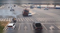 LiveLeak - Car narrowly avoids being crushed by truck that flipped over on Chinese road