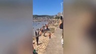 LiveLeak - Hundreds of people catch fish leaping out of river in Chinas Yueqing