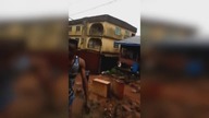 LiveLeak - Shocking moment three-storey block collapses in Nigeria after downpour