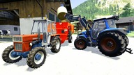 Tractor Collects Bales Of Grass And Tractor With Front Forks - mixture for cows | modern farmer LS19