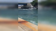 LiveLeak - Two men rescued after boat sinks in the Boynton Inlet, Florida