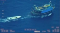 LiveLeak - Why is that fishing trawler towing an empty wooden boat at high seas