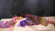 EXPERIMENT Glowing 1000 degree KNIFE VS Rubber Band Ball