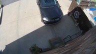 LiveLeak - Father catches flying pool umbrella