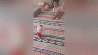 LiveLeak - Chinese baby gets scared by voice-activated toy